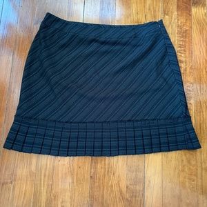 Uniform petite short bottom pleat‎ skirt. Never worn .